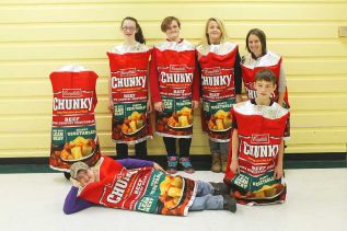 Back Row: Camille, Madi, Brittany, Darian, Ms. Bovard, Front Row: Matthew, Anthony; photo by Summer Andrew